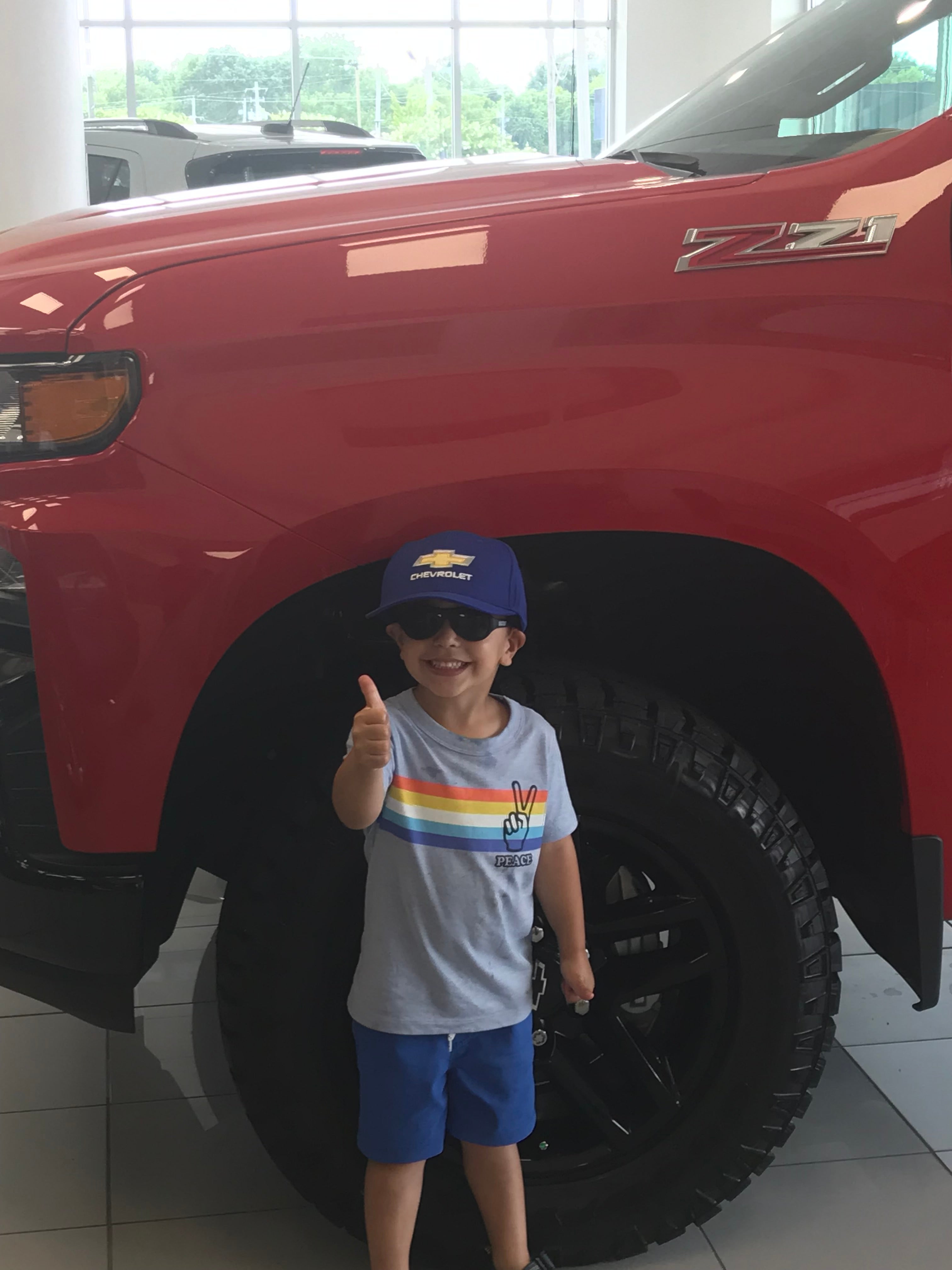 Young fan with truck
